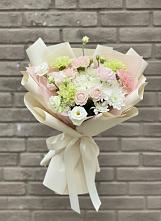 Букет цветов из:  Гвоздики, Розы, Лизиантусы и Хризантемы в Умёте